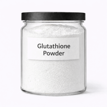 Glutathione Powder by Organicsbyjumira — ultra-fine bright white cosmetic-grade antioxidant powder in a clear laboratory jar.