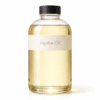 “Jojoba Oil by Organicsbyjumira — clear golden-yellow cosmetic-grade carrier oil in an amber bottle.”
