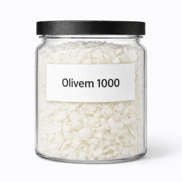 Olivem 1000 by Organicsbyjumira — white lightweight cosmetic emulsifying flakes used for stable lotions and creams.