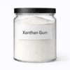 Xanthan Gum by Organicsbyjumira — off-white fine cosmetic thickening powder with smooth, slightly granular texture for lotions, gels, and emulsions.