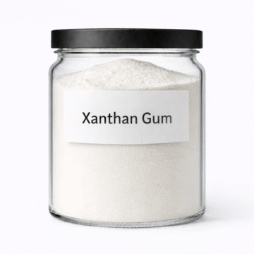 “Xanthan Gum by Organicsbyjumira — off-white fine cosmetic thickening powder with smooth, slightly granular texture for lotions, gels, and emulsions.”