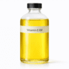 Vitamin E Oil by Organicsbyjumira — thick golden antioxidant-rich oil with glossy clarity for restorative and nourishing skincare formulations.