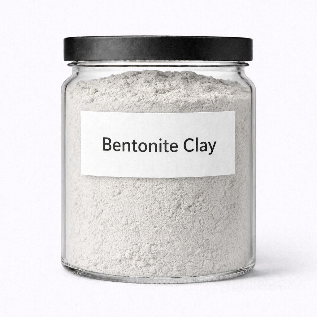 “Bentonite Clay by Organicsbyjumira — soft gray-green ultra-fine clay powder with natural earthy texture for masks, detox blends, and cosmetic formulations.”