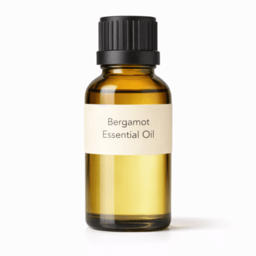 “Bergamot Essential Oil by Organicsbyjumira — light yellow citrus-aromatic essential oil in an amber bottle for skincare, aromatherapy, and uplifting formulations.”