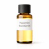 “Peppermint Essential Oil by Organicsbyjumira — clear to pale yellow sharp, menthol-aromatic essential oil in an amber bottle for skincare and aromatherapy formulations.”