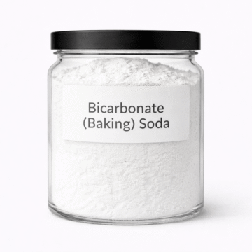 “Bicarbonate (Baking) Soda by Organicsbyjumira — pure white fine crystalline powder with soft granules for skincare, deodorant, and exfoliating formulations.”