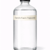 “Caprylic/Capric Triglyceride (CCT Oil) by Organicsbyjumira — clear lightweight emollient oil used for skincare, dilution, and cosmetic formulation.”