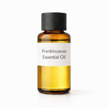 “Frankincense Essential Oil by Organicsbyjumira — pale yellow aromatic essential oil in an amber bottle for skincare, aromatherapy, and holistic wellness formulations.”