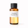 “Geranium Essential Oil by Organicsbyjumira — pale yellow aromatic essential oil with a soft pinkish-gold tint in an amber bottle for skincare and aromatherapy formulations.”