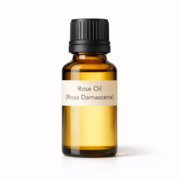 “Rose Oil by Organicsbyjumira — pale yellow aromatic floral oil in a clear bottle, ideal for skincare, perfumery, and luxury cosmetic formulations.”