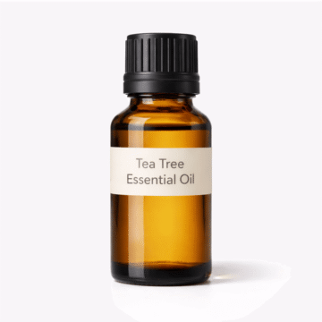 “Tea Tree Essential Oil by Organicsbyjumira — clear to pale yellow aromatic oil in an amber bottle, ideal for skincare, purifying formulations, and aromatherapy.”