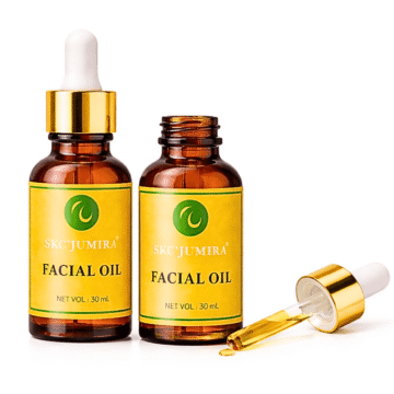 “SKC’Jumira two Facial Oil 30ml amber glass bottle with gold dropper cap on a white background.”