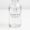"Close-up image of a transparent liquid containing glycolic acid, a powerful skincare ingredient. This gentle exfoliant and anti-aging compound helps improve skin texture, reduce hyperpigmentation, and refine pores. Transform your skincare routine with glycolic acid for fresh and radiant skin."