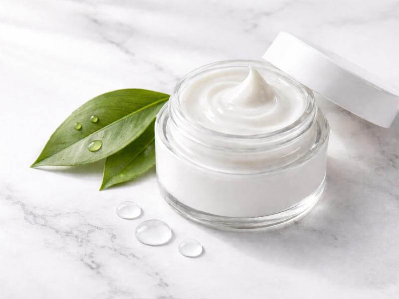 Finished 10% azelaic acid brightening cream in a glass jar made with Jumira Naturals ingredients Nigeria