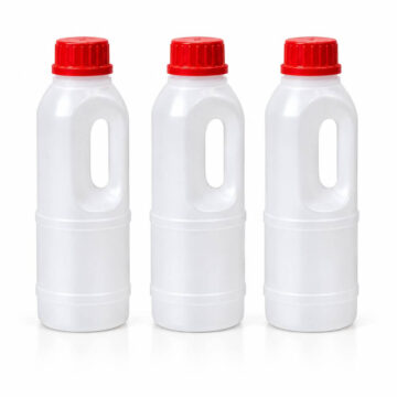 white opaque plastic bottles with red screw caps
